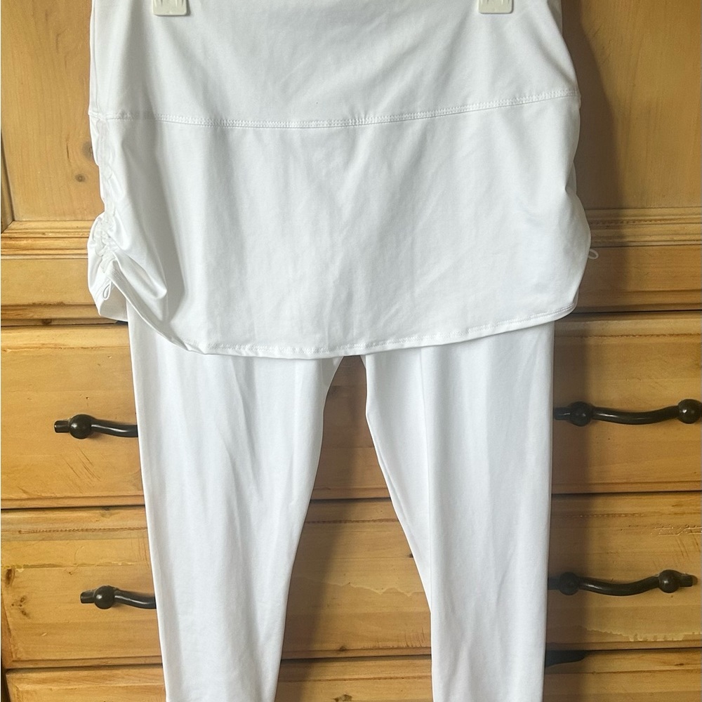 Bright white tennis skirt with attached leggings, size Large.